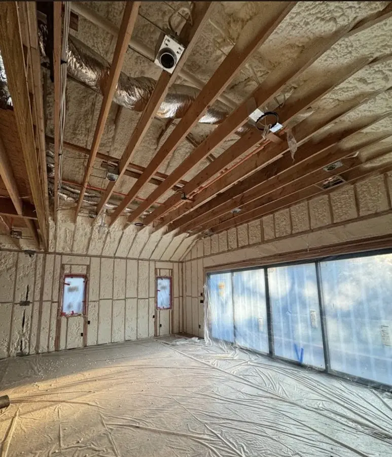 Interior walls and ceiling insulated with spray foam during new construction in St. George
